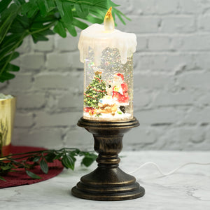 Holiday decorations, beautiful christmas snowglobe candle with lights and music, santa with reindeers by Sona Casa